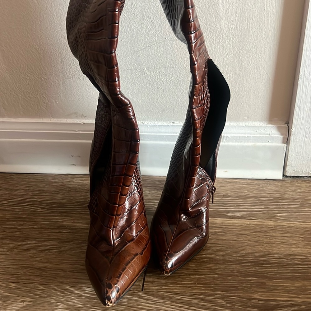 Trendy snake skin boots